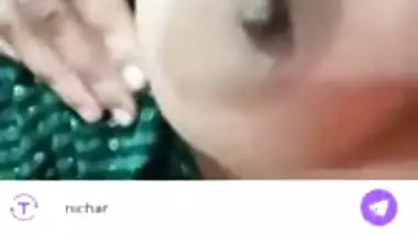 Stripchat girl Trisha playing with naked boobs