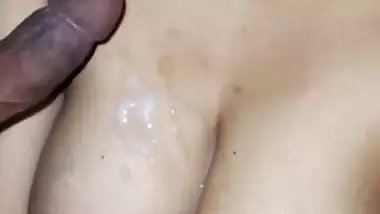 Cumshot on indian wife boobs