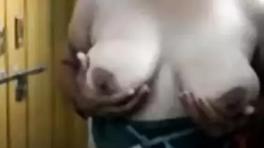 Cute girl showing her cute boob